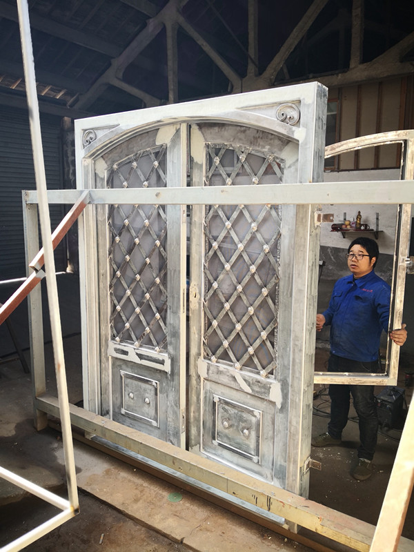 Puerta de Hierro forjado de vidrio bajo e