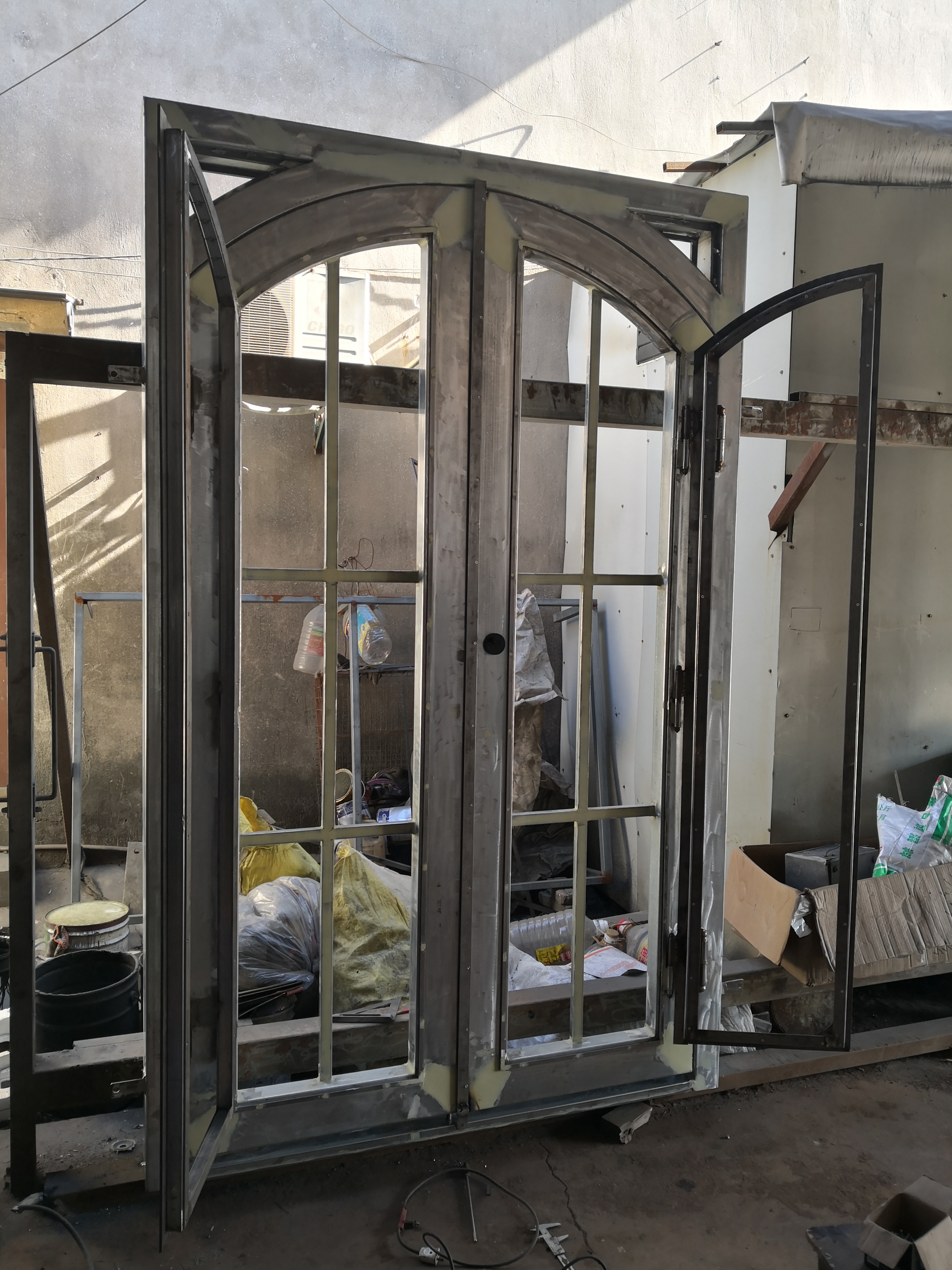 Puerta de Hierro forjado de vidrio bajo e