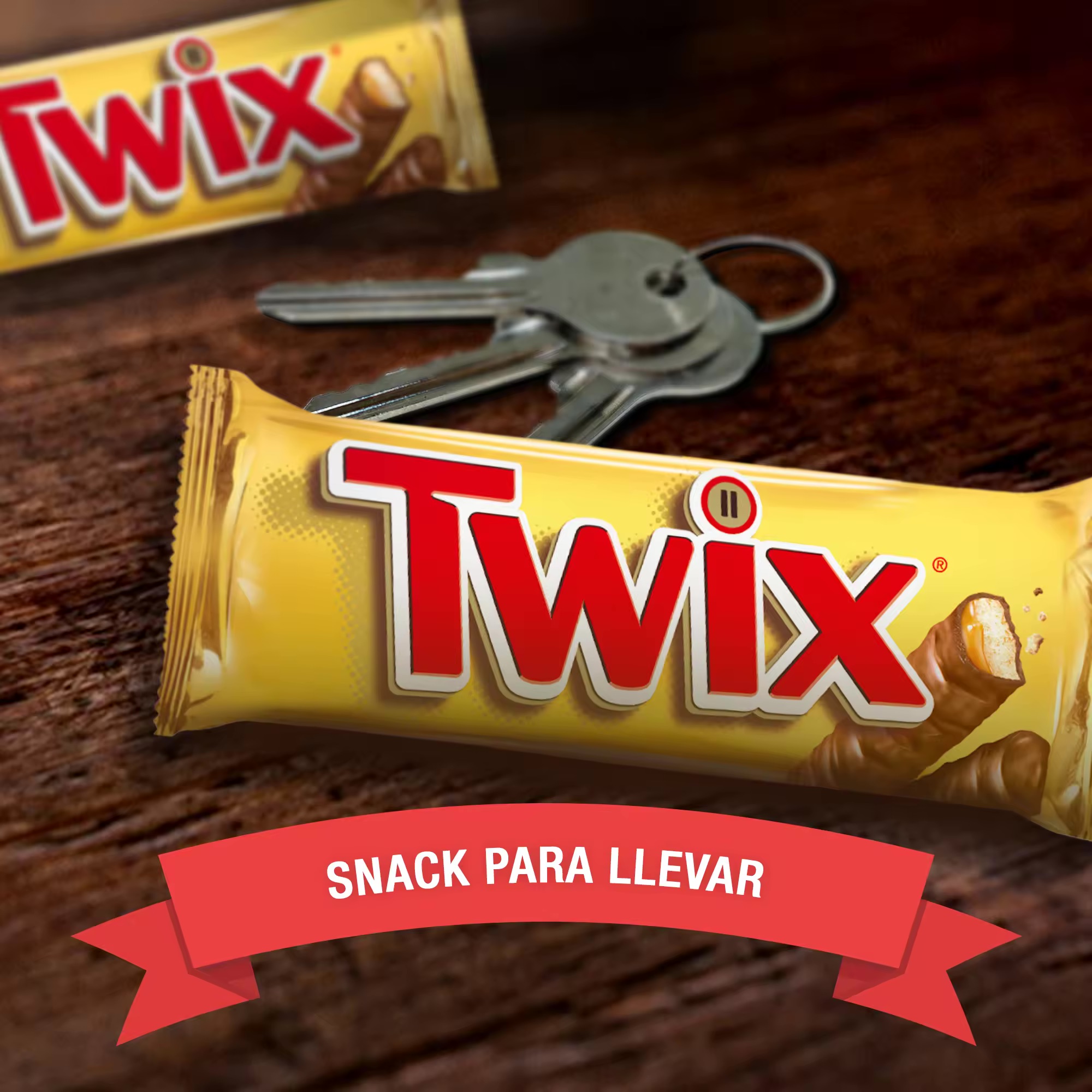 Chocolatina Twix con Galleta crujiente y suave caramelo recubiertos de chocolate con leche - 25x50g