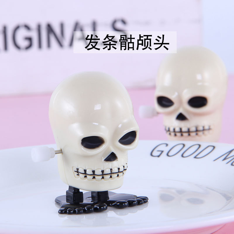 子供のためのスカルジャンプおもちゃ,1ピース,巻き毛のおもちゃ