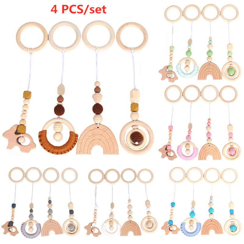 Baby Play Gym กรอบไม้ Beech กิจกรรมรถเข็นเด็กแขวนจี้ของเล่น Teether แหวนพยาบาล Rattle ของเล่นตกแต่งห้อง