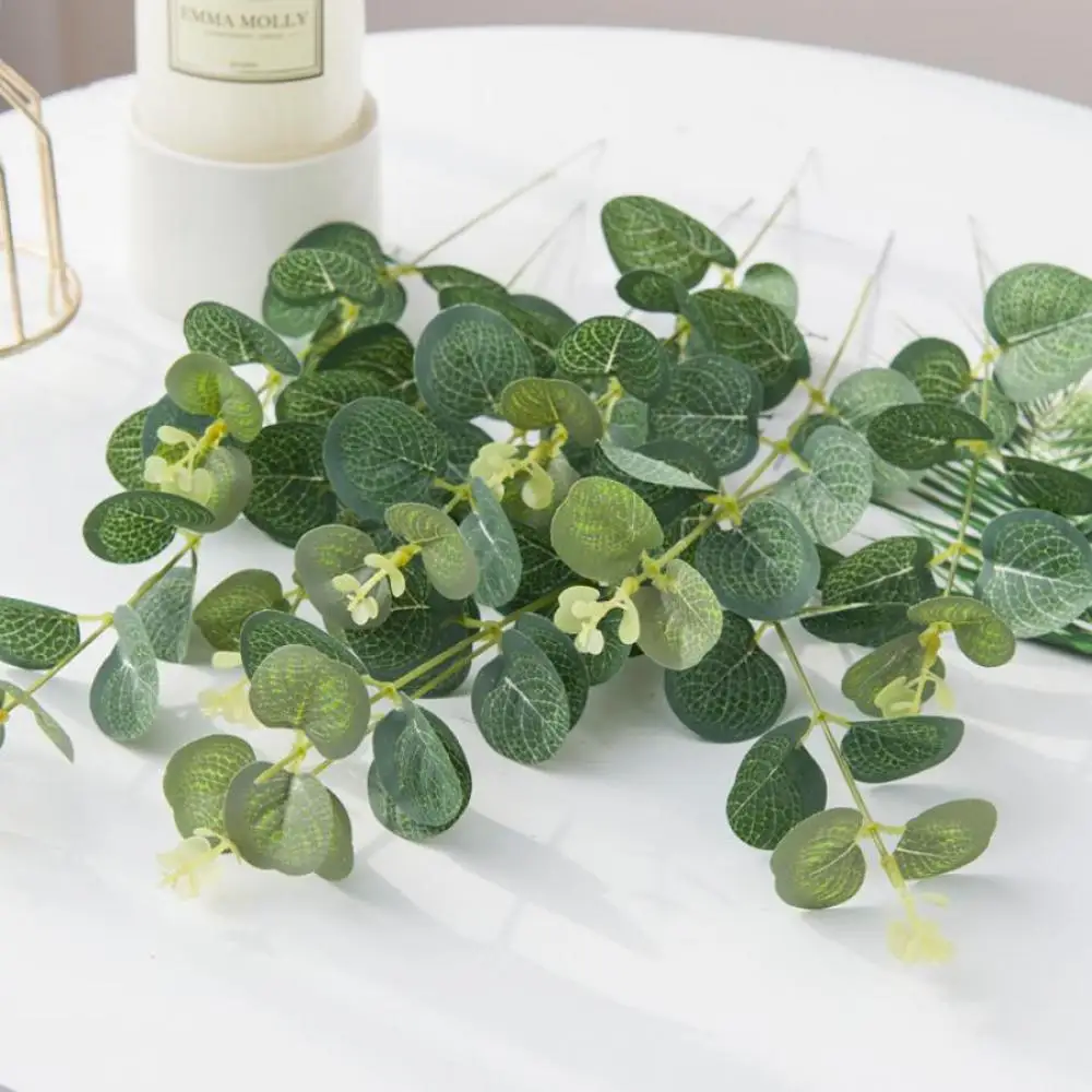 Günstige Eukalyptusblätter, künstliches Gras, Festival-Dekoration, Outdoor, Zuhause, Zimmer, Hochzeit, dekorative Blumen, Kranz, DIY, künstliche Pflanzen