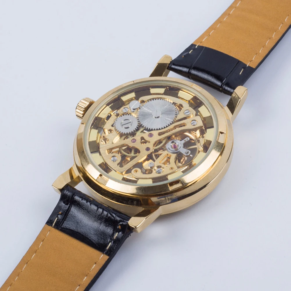ขายร้อนผู้ชายแฟชั่น Luxury Hollow Skeleton Round Dial สายหนัง Faux นาฬิกาข้อมือนาฬิกาแฟชั่นผู้ชายกีฬานาฬิกานาฬิกาข้อมือเย็น