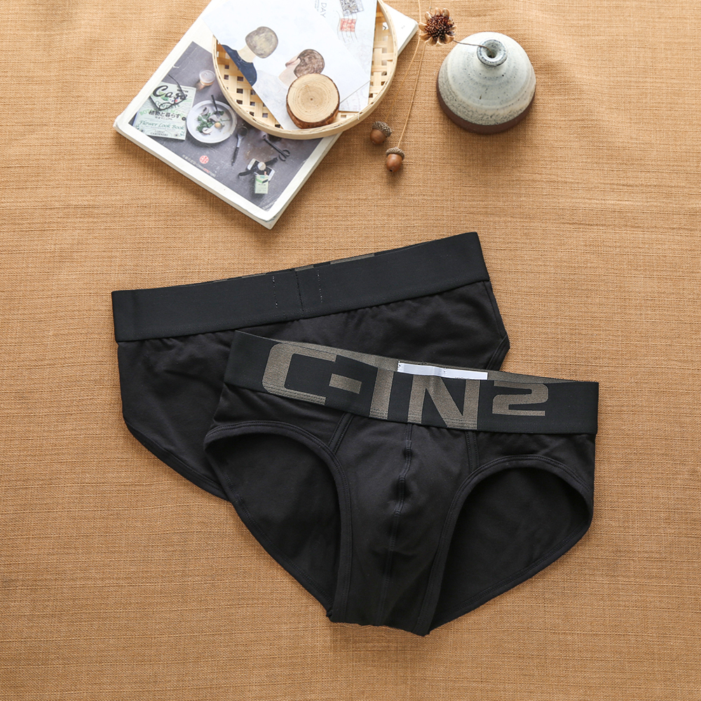 Ropa interior de marca para hombre, calzoncillos Boxer juveniles con letras cómodas y transpirables, tendencia de moda de algodón Sexy
