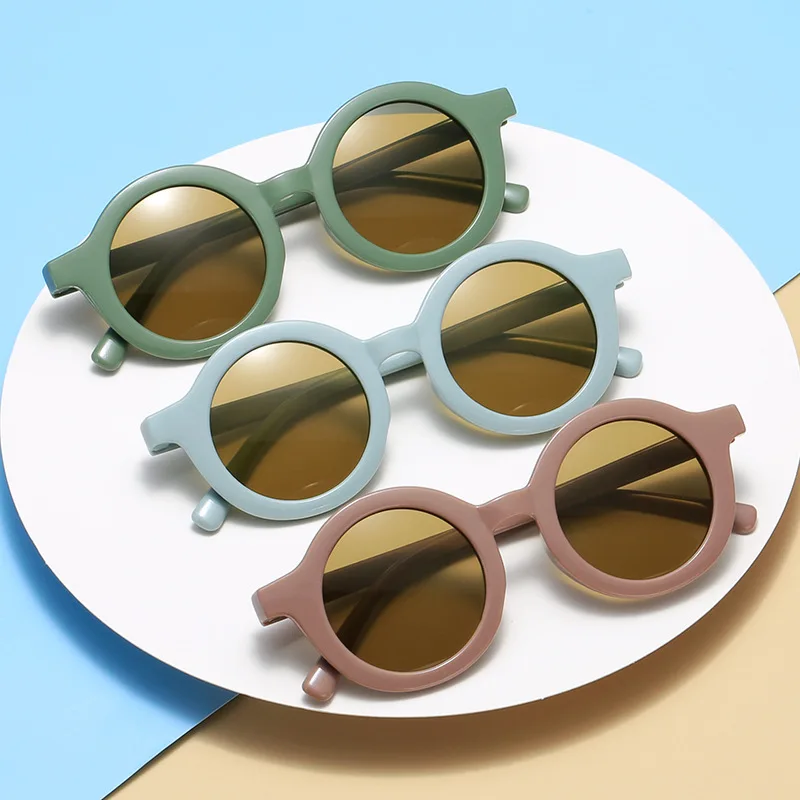 Gafas de sol con montura redonda para bebé, lentes de Color caramelo, protección Uv de Color sólido, redondas y cómodas, estilo Retro, novedad