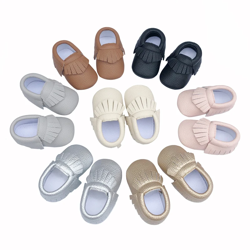 Mocasines de bebé hechos a mano suave inferior moda borlas bebés recién nacidos niñas zapatos 12 colores PU cuero niño niños Prewalkers botas