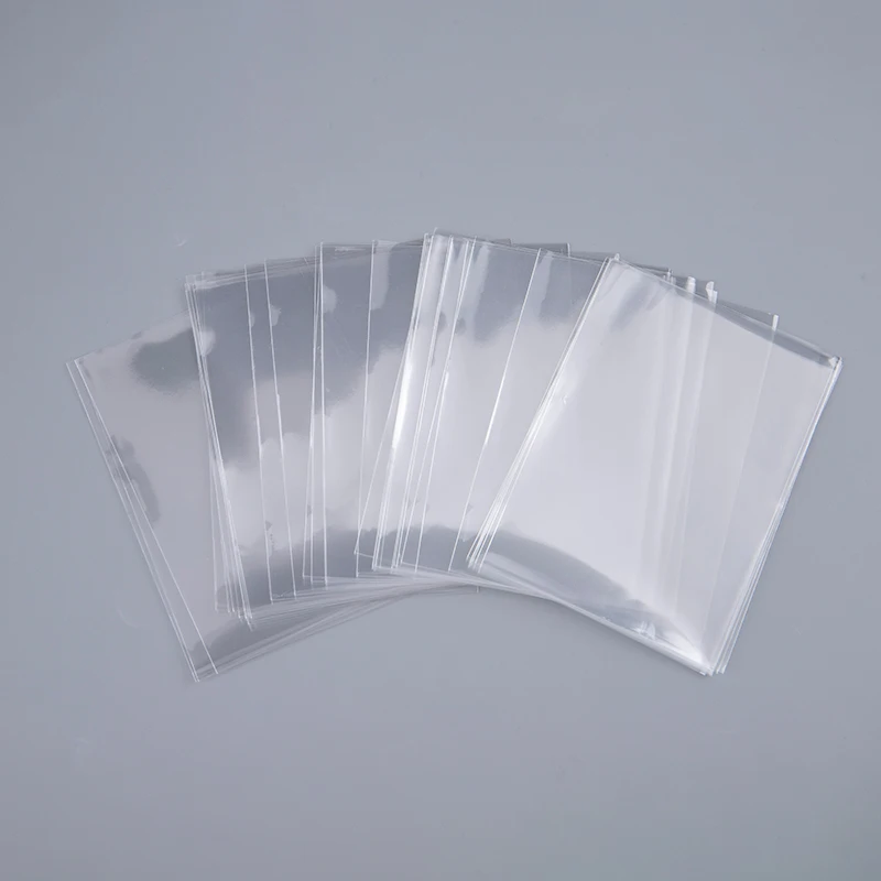 100 Chiếc 65*90 Trong Suốt Bộ Sưu Tập Thẻ Phim Thẻ Trò Chơi Bảo Vệ Giết Tay Và Thẻ ID Tấm Bảo Vệ Túi