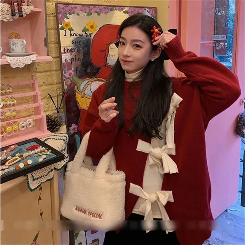 Sweter Lindung Nilai Bagian Simpul Busur Natal Musim Gugur dan Musim Dingin Blus Wanita Leher Bulat Baru Semua Cocok Atasan Lengan Panjang Longgar Hangat