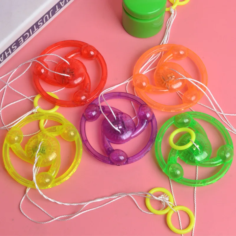 1 pçs crianças criativo fio de apoio brinquedo luminoso volante flash girando topo giroscópio emissor de luz fitness brilhante puxar linha volante