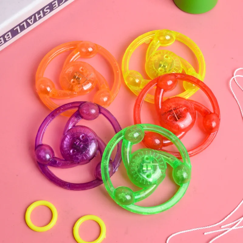1 pçs crianças criativo fio de apoio brinquedo luminoso volante flash girando topo giroscópio emissor de luz fitness brilhante puxar linha volante