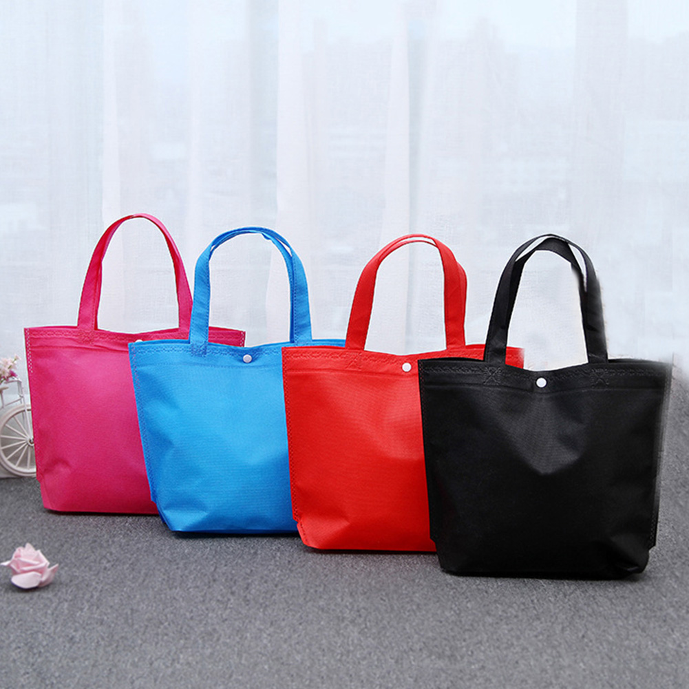 Nova chegada qualidade reutilizável dobrável botão saco de compras durável não-tecido bolsa de armazenamento bolsa de compras sacos ecológicos