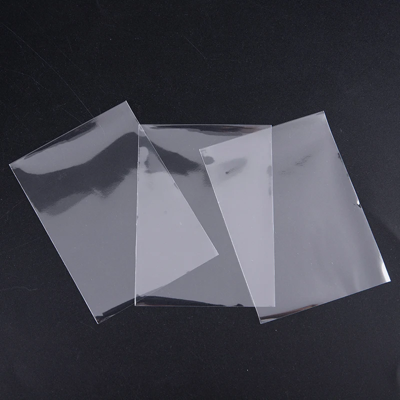 100 Chiếc 65*90 Trong Suốt Bộ Sưu Tập Thẻ Phim Thẻ Trò Chơi Bảo Vệ Giết Tay Và Thẻ ID Tấm Bảo Vệ Túi