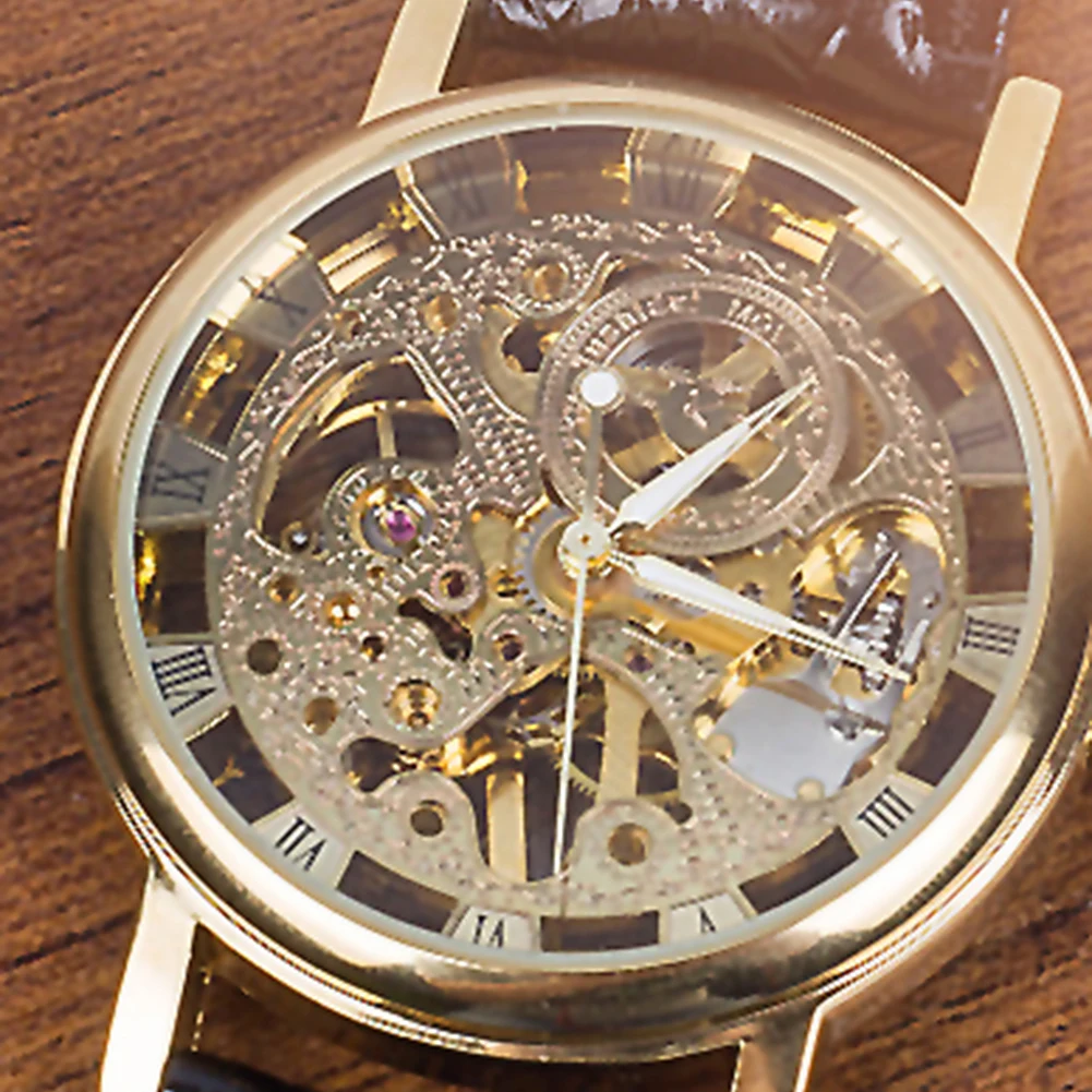 ขายร้อนผู้ชายแฟชั่น Luxury Hollow Skeleton Round Dial สายหนัง Faux นาฬิกาข้อมือนาฬิกาแฟชั่นผู้ชายกีฬานาฬิกานาฬิกาข้อมือเย็น