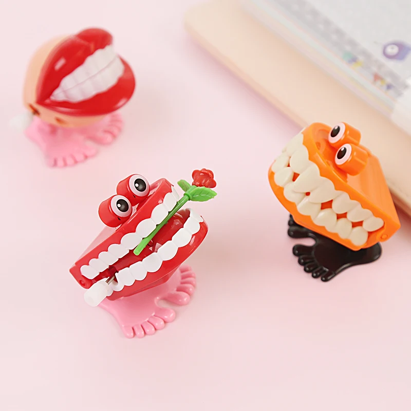1 PCS Đồ Chơi trên Các Đồ Chuỗi Nhảy Bốn Đoạn Phong Cách Răng Ngẫu Nhiên Bạn Bè Juguetes