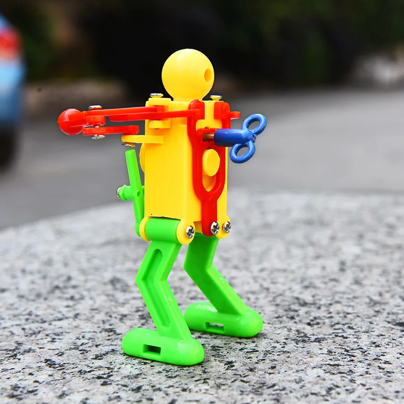 New Cổ Điển Gió Lên Đồ Chơi Trẻ Em Trẻ Em Nhựa Clockwork Mùa Xuân Gió Up Dancing Robot Đồ Chơi Quà Tặng màu sắc Ngẫu Nhiên