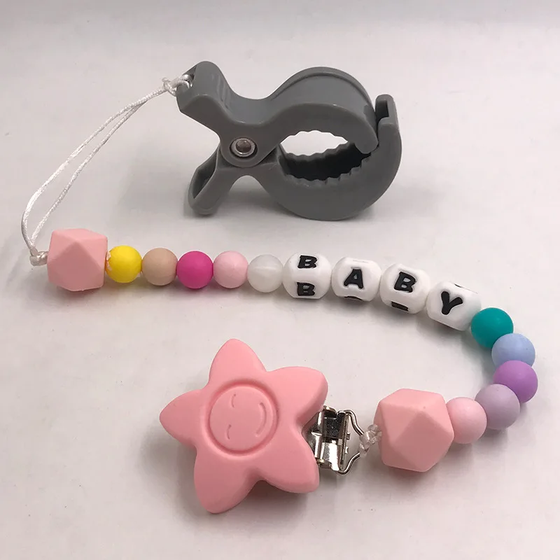 赤ちゃんのおもちゃガラガラアクセサリーキャンディーカラー乳母車ベビーカー 1pc フックとおもちゃブランケットクリッププラスチックユニバーサルクリップ