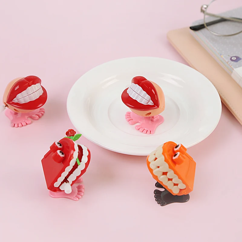 1 PCS Đồ Chơi trên Các Đồ Chuỗi Nhảy Bốn Đoạn Phong Cách Răng Ngẫu Nhiên Bạn Bè Juguetes