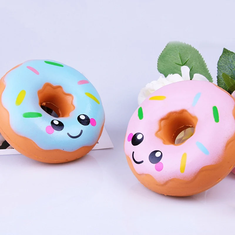 น่ารักยิ้ม Donut Squishy จําลองที่เพิ่มขึ้นช้า PU ขนมปังเค้กหอมนุ่มบีบของเล่นความเครียดบรรเทาสําหรับเด็กสนุกของขวัญ 10*10 ซม.