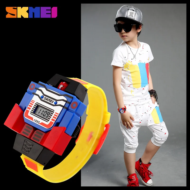 SKMEI แฟชั่นนาฬิกาเด็กดิจิตอลวันที่การ์ตูนเด็กกีฬานาฬิกา Relogio หุ่นยนต์ Transformation นาฬิกาข้อมือเด็ก 1095