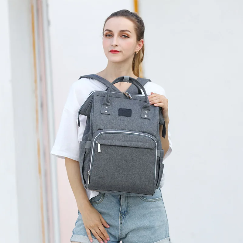 Mochila de fraldas múmia grande capacidade saco mãe bebê multi-função à prova dwaterproof água sacos de fraldas de viagem ao ar livre para cuidados com o bebê