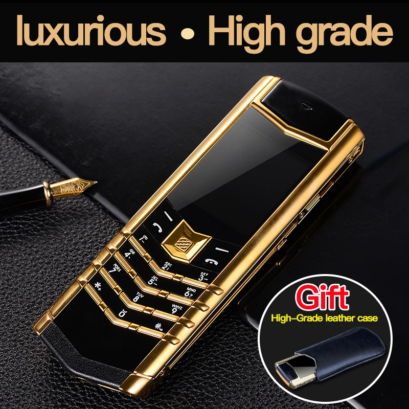 Teléfono V10 de lujo con cuerpo de cuero metálico Ranura para tarjeta dual Teclado invisible Radio FM y cámara - Diseño unisex premium