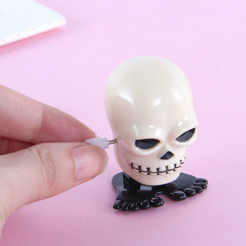 子供のためのスカルジャンプおもちゃ,1ピース,巻き毛のおもちゃ