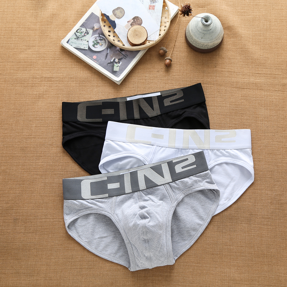 Ropa interior de marca para hombre, calzoncillos Boxer juveniles con letras cómodas y transpirables, tendencia de moda de algodón Sexy