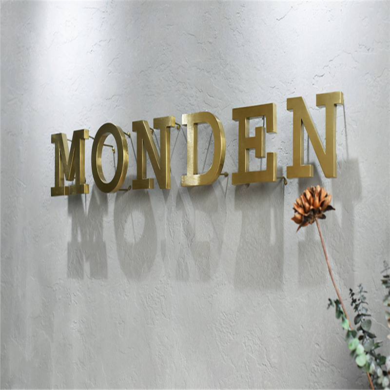 Kundenspezifisches LED-Buchstabenschild aus goldfarbenem, hochglanzpoliertem, gebürstetem Edelstahl mit hintergrundbeleuchtetem LED-Buchstabenschild, hinterbeleuchtetem Store-Business-Logo