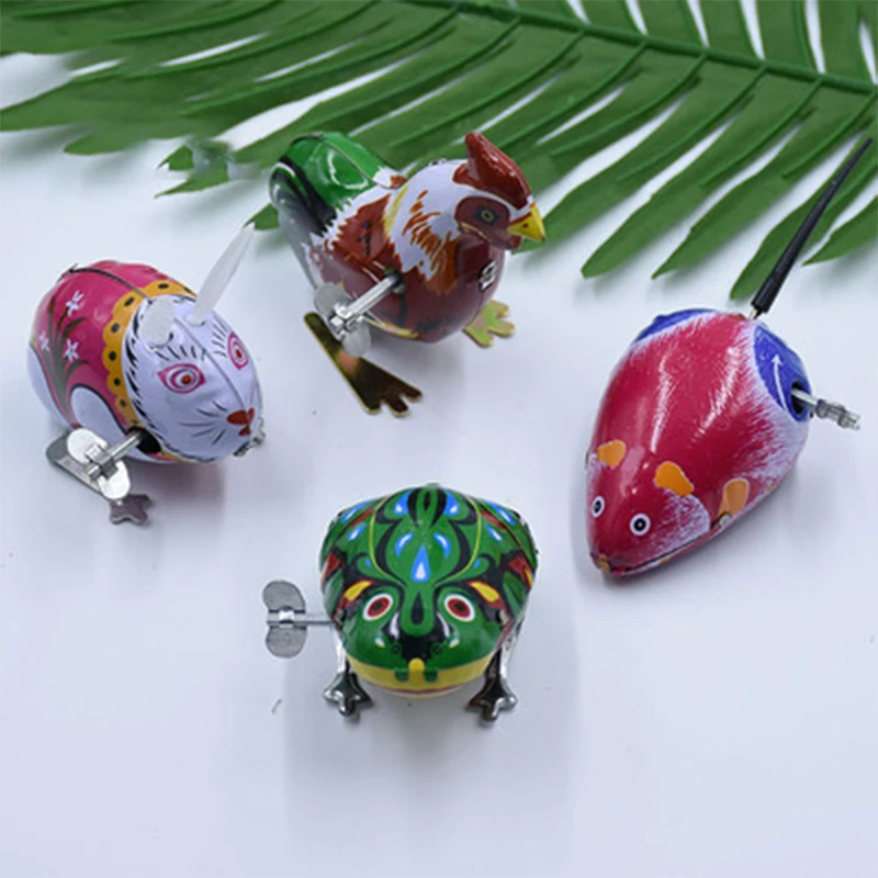 Trẻ Em Classic Sắt Đồng Hồ Đồ Chơi Nhảy Ếch Con Gà Trống Thỏ Chuột Rùa Retro Đồ Chơi Xếp Hình Giáo Dục Trẻ Em Quà Tặng