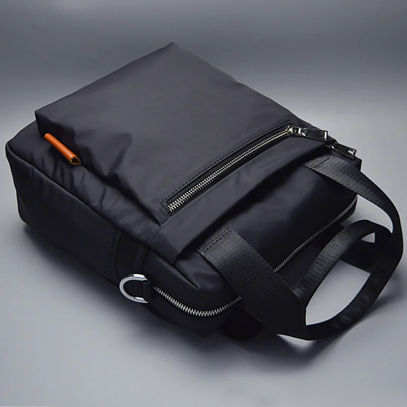 ใหม่ผู้ชายกระเป๋ากันน้ำกันน้ำ Multi-Function ขนาดใหญ่แนวตั้งธุรกิจกลางแจ้ง Casual handba