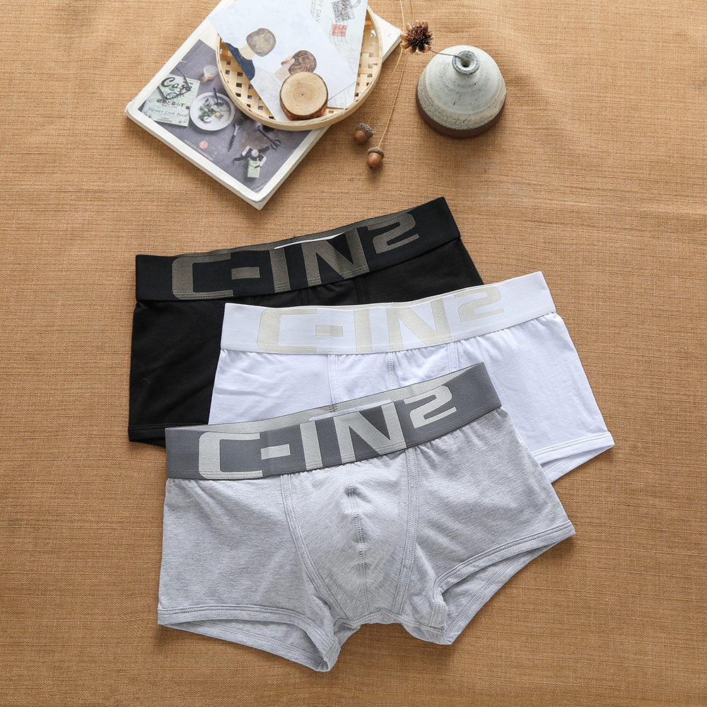 Ropa interior de marca para hombre, calzoncillos Boxer juveniles con letras cómodas y transpirables, tendencia de moda de algodón Sexy