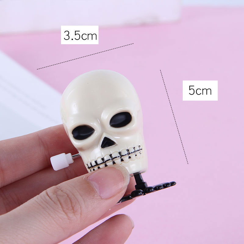 子供のためのスカルジャンプおもちゃ,1ピース,巻き毛のおもちゃ