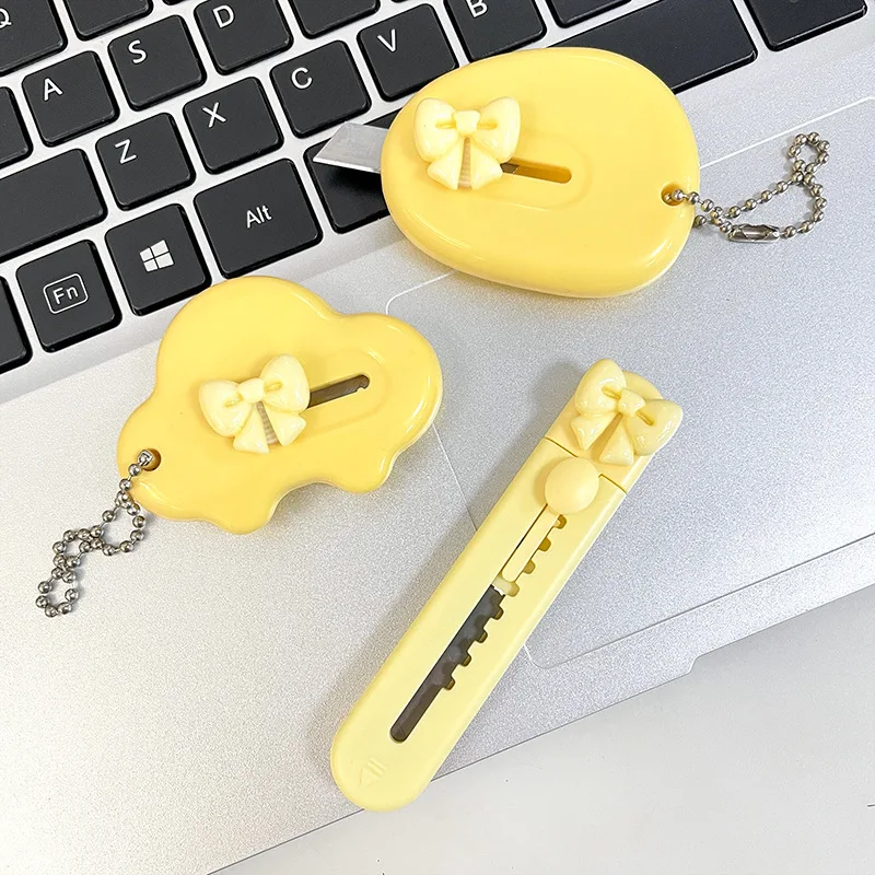 Mini couteau utilitaire d'art à nœud jaune mignon, couteau à papier, couteau rétractable pour déballage de paquets Express, papeterie cadeau