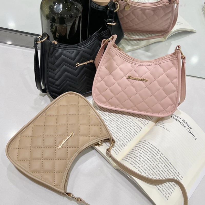 Bolsa de axila bordada nova bolsa de raízes bolsa de ombro versátil da moda feminina