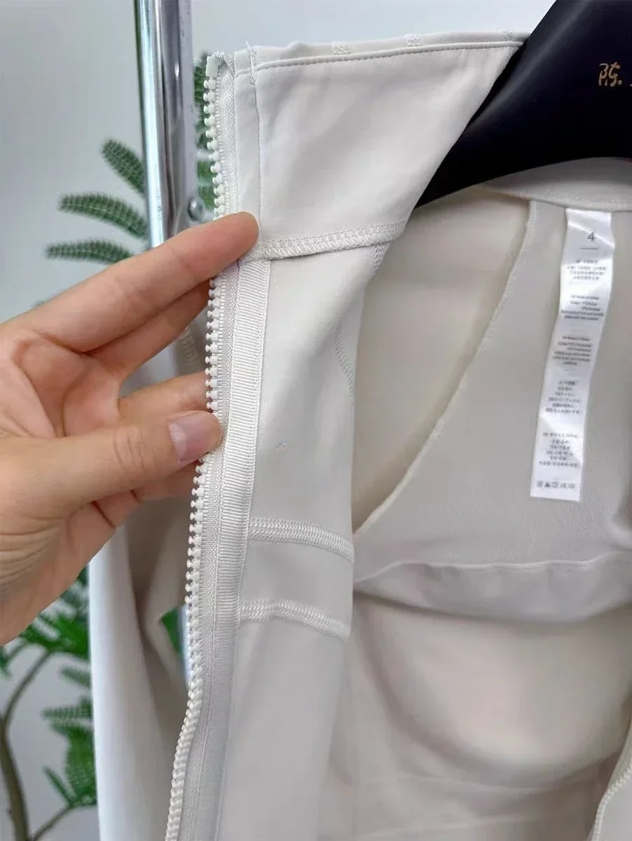 มะนาวแขนยาวพร้อมกระเป๋า Cropped กําหนดเสื้อกีฬา Quick Dry Breathable ฟิตเนสโยคะวิ่ง Zip Up Jacket เสื้อออกกําลังกาย