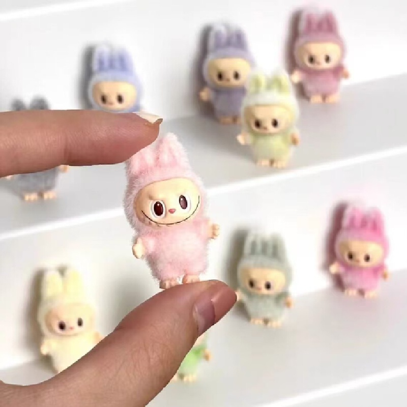 Labubu de primera generación, bonita estación de partículas, juguete de peluche de postura, Mini bolso colgante, accesorios Diy, accesorio de cadena para teléfono móvil