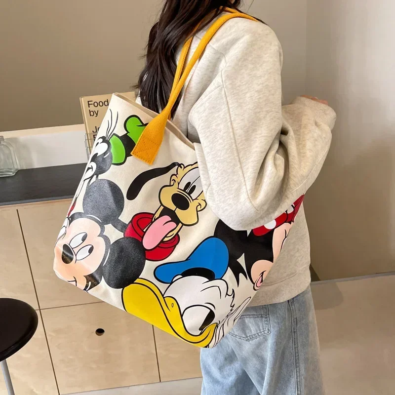 Disney Mickey Mouse Cartoon płócienna torba na ramię o dużej pojemności kobieca śliczna torba studencka tornister Minnie torebka