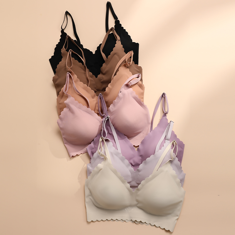 Venda quente 9 cores sutiã confortável wirefree acolchoado borda ondulada coreia corte a laser invisível yoga wear senhoras sutiã sem costura feminino