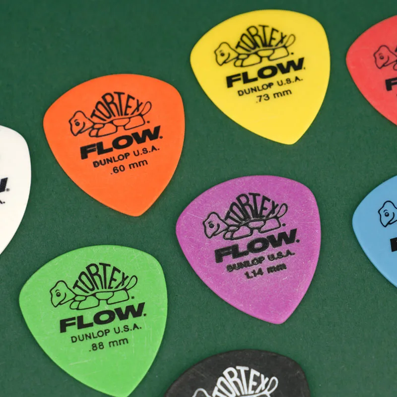 Dunlop Pick. 558R FLOW TORTEX material non-slip scrub guitar pick. Thickness: 0.50/0.60/0.73/0.88/1.00/1.14/1.35/1.50mm.