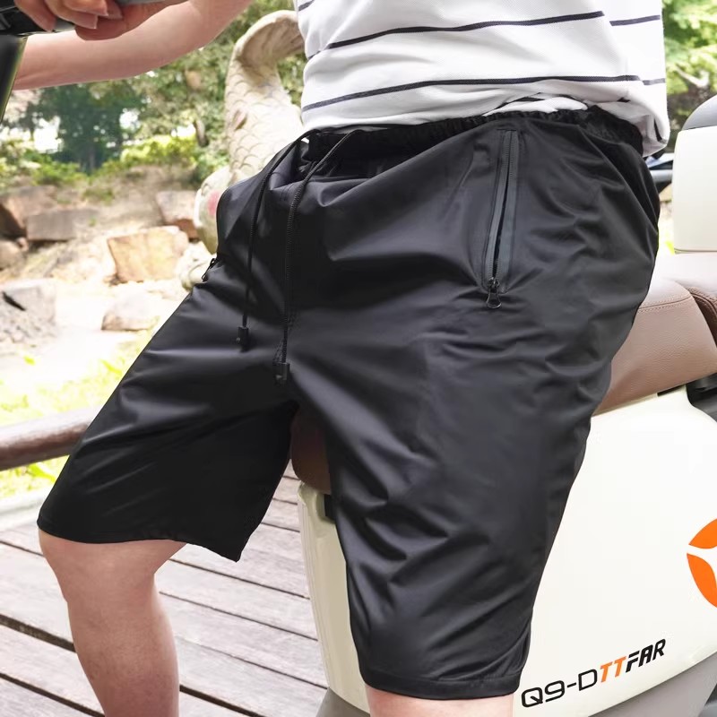 Shorts impermeáveis impermeáveis à prova de chuva do homem com bolso impermeável do zíper