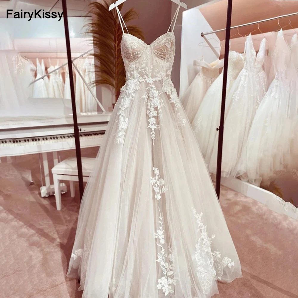 FairyKissy Abiti da sposa sexy con spalline in rete nuda trasparenti con disossamento a vista Abito da sposa in pizzo principessa senza schienale