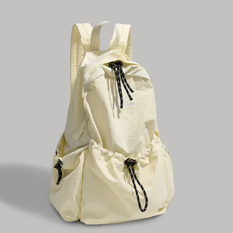 Mochila de nailon liso de gran capacidad, superventas 2025, correa de cojín de aire, mochila informal suave, bolsos escolares con marco exterior y mango suave