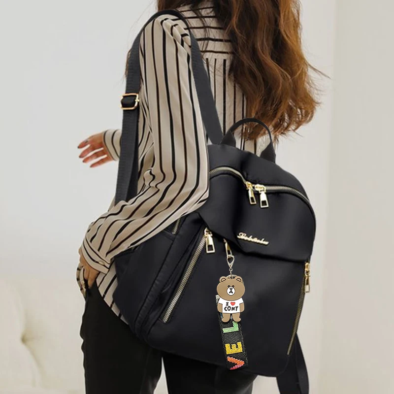 The Neutral Color Backpack with Both Shoulder Straps Is Suitable for Travel, as Well as for Carrying Accessories and Books