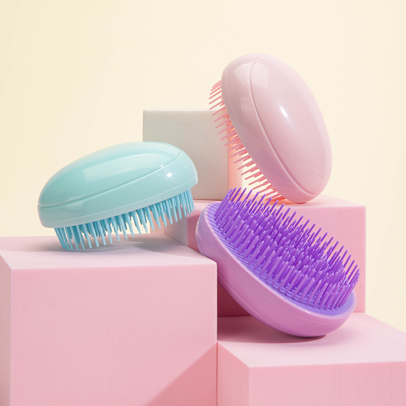 Mini cepillo para desenredar el cabello, cepillos para el cabello de forma redonda de huevo, peines para alisar el cabello anudados, herramientas de masaje antiestático para el cuidado del cabello