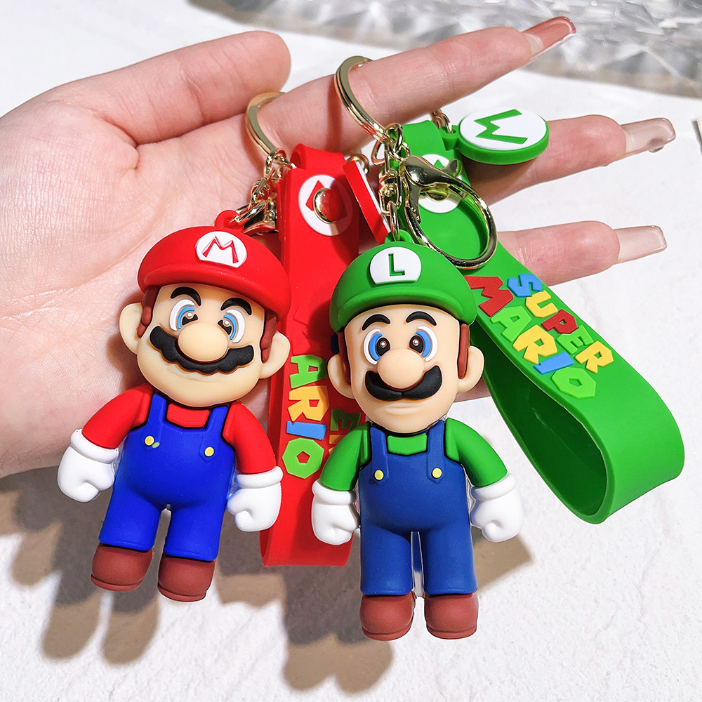 Juego Super Mario Bros llavero figura de Anime decoración del coche mochila colgante accesorios niños juguete regalos de cumpleaños de Navidad