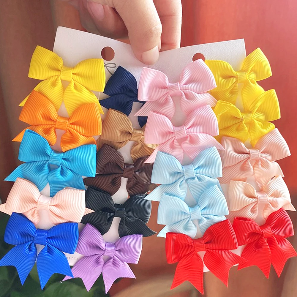 10 ピース/セット新かわいいソリッドリボンちょう結びヘアクリップ女の赤ちゃん手作り弓ヘアピンバレッタ帽子子供ヘアアクセサリー