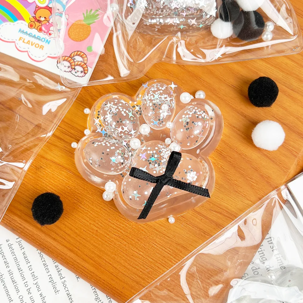Creative TPR โปร่งใสสีดํา Bow Cat PAW ช้า Rebound บีบของเล่นการ์ตูน Cat Claw Sticky Pinch Sensory ของเล่นสําหรับของขวัญเด็ก