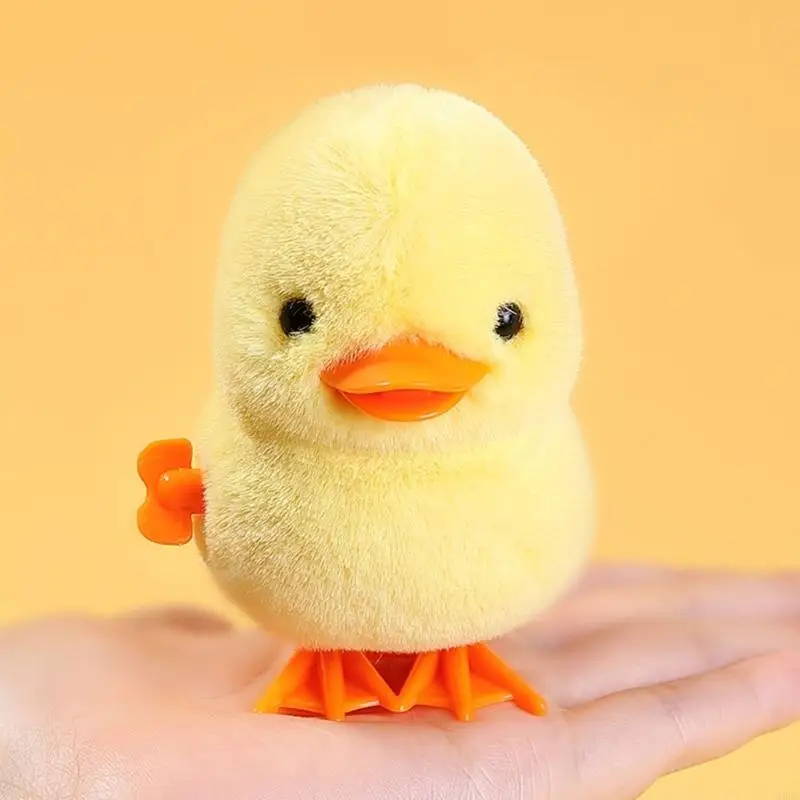 Q0kbジャンプチキンアヒルはおもちゃを巻き上げて、子供向けのおもちゃを歩き回る幼児のパーティーを好むグッディバッグフィラーの誕生日ギフト