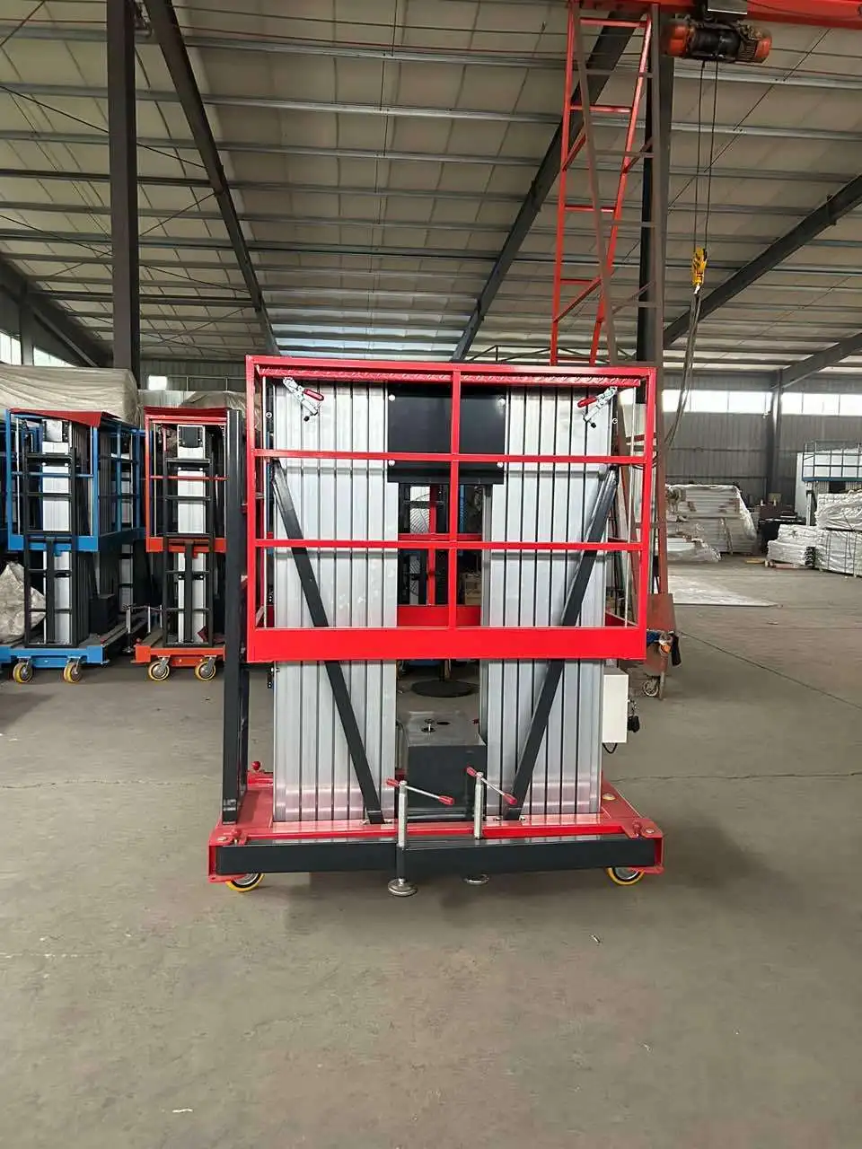 Mesas elevatorias eléctricas para hombre aprobadas por la CE, escaleras de andamio, elevador de mástil de aluminio móvil hidráulico para construcción