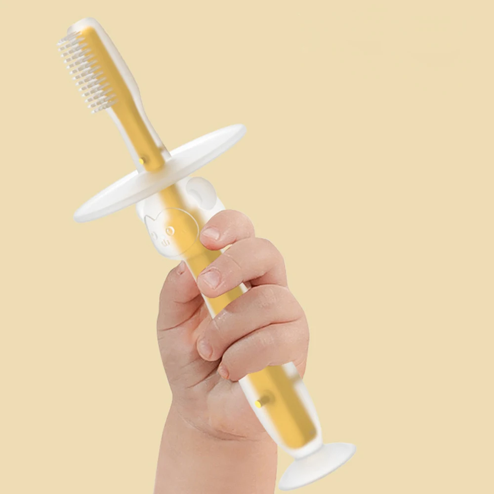 1 peça 100% grau alimentício alça macia flexível mordedor de borracha de silicone treinamento infantil escova de dentes para bebê preço de fábrica